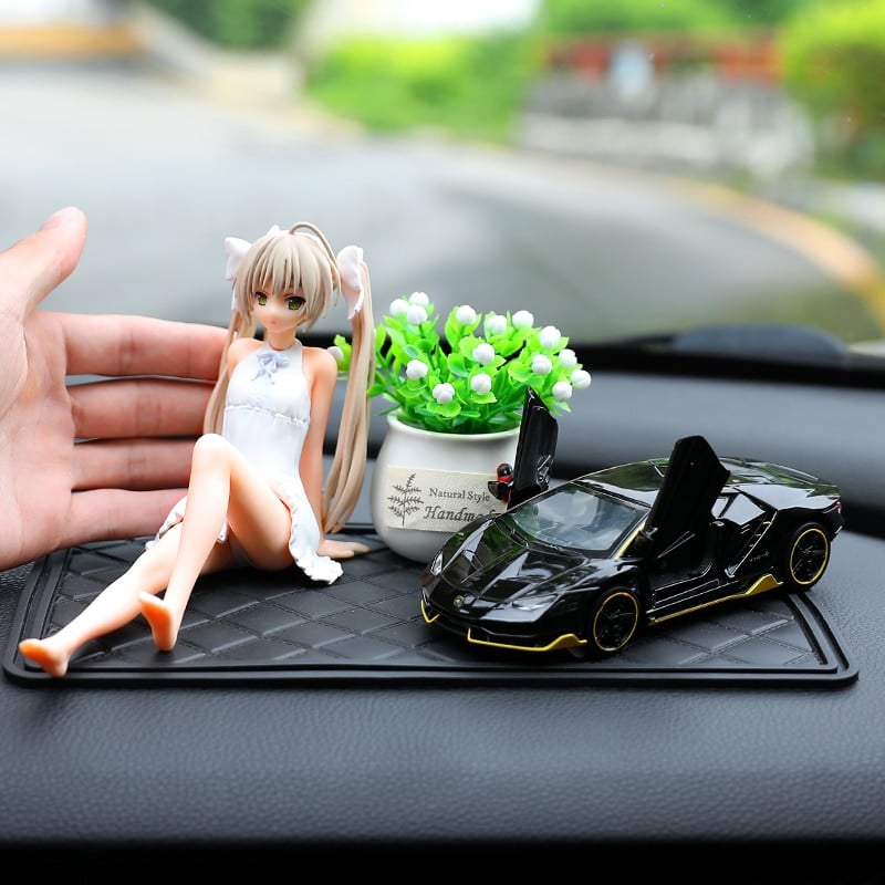 Figurine décorative voiture fille qui bouge position assise - Grimit